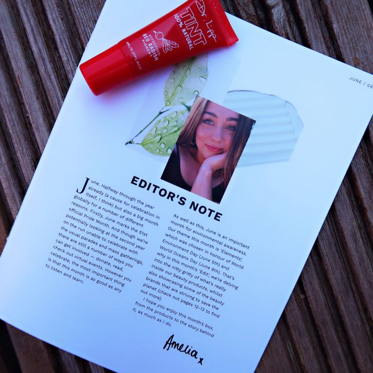 Editor's note inside LOOKFANTASTIC Beauty Edit magazine with Dr Lipp red lip tint flat laid